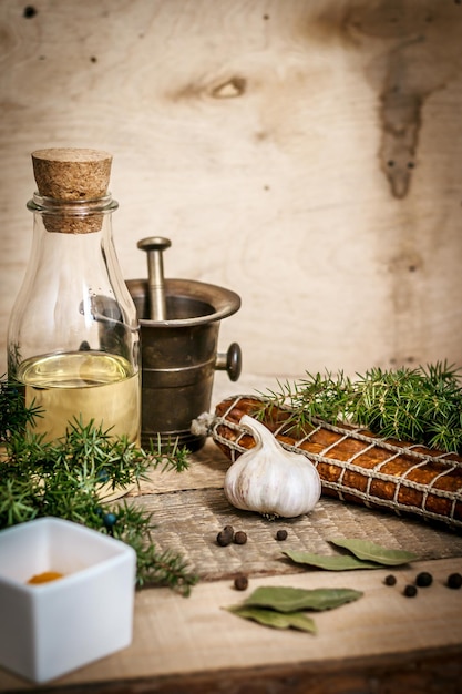 Rustic kitchen utensils and herbs